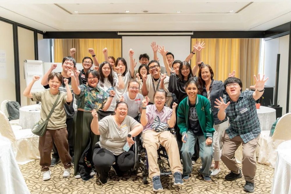 Youth leaders celebrating at the OnePeople.sg Youth Advocacy Workshop